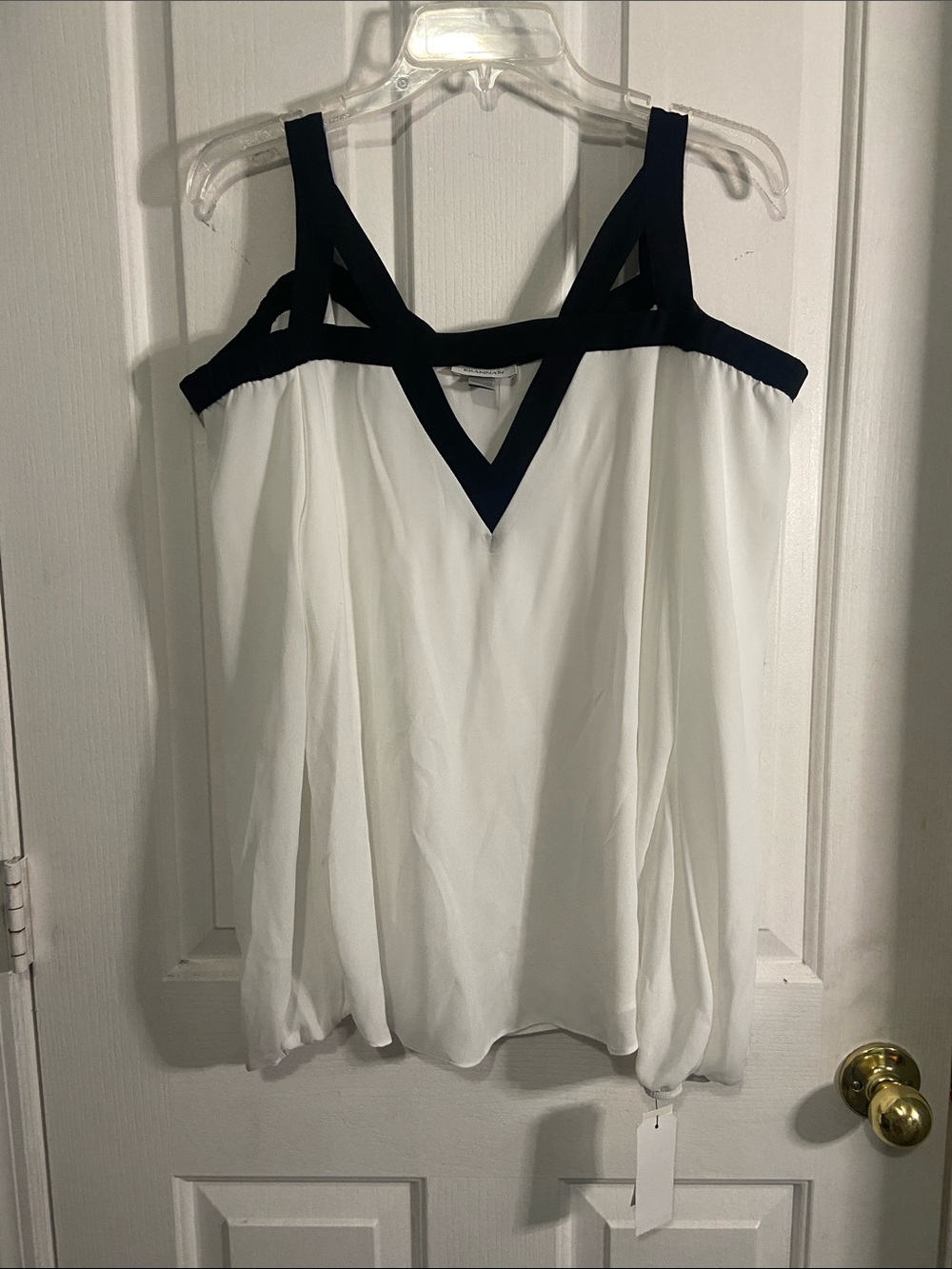 White Cold-Shoulder Blouse with Black Trim